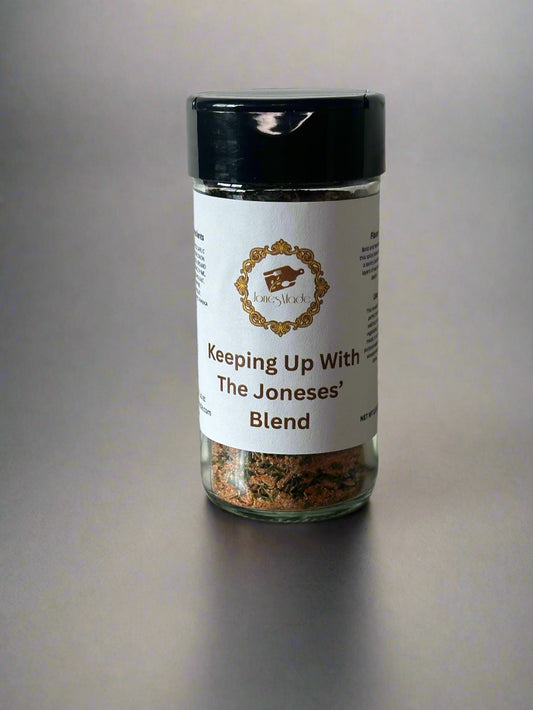 A spice blend jar labeled ' Keeping Up With The Joneses' Blend - All Purpose Seasoning' containing a mix of ground herbs and spices.